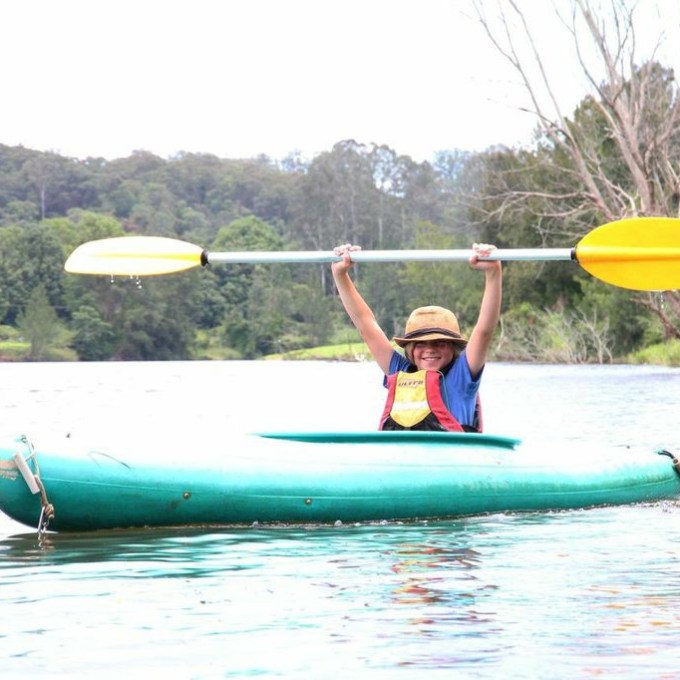 a man riding a surfboard in the water