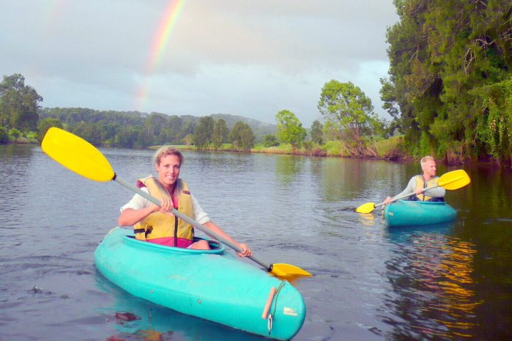 a group of people on a boat in the water